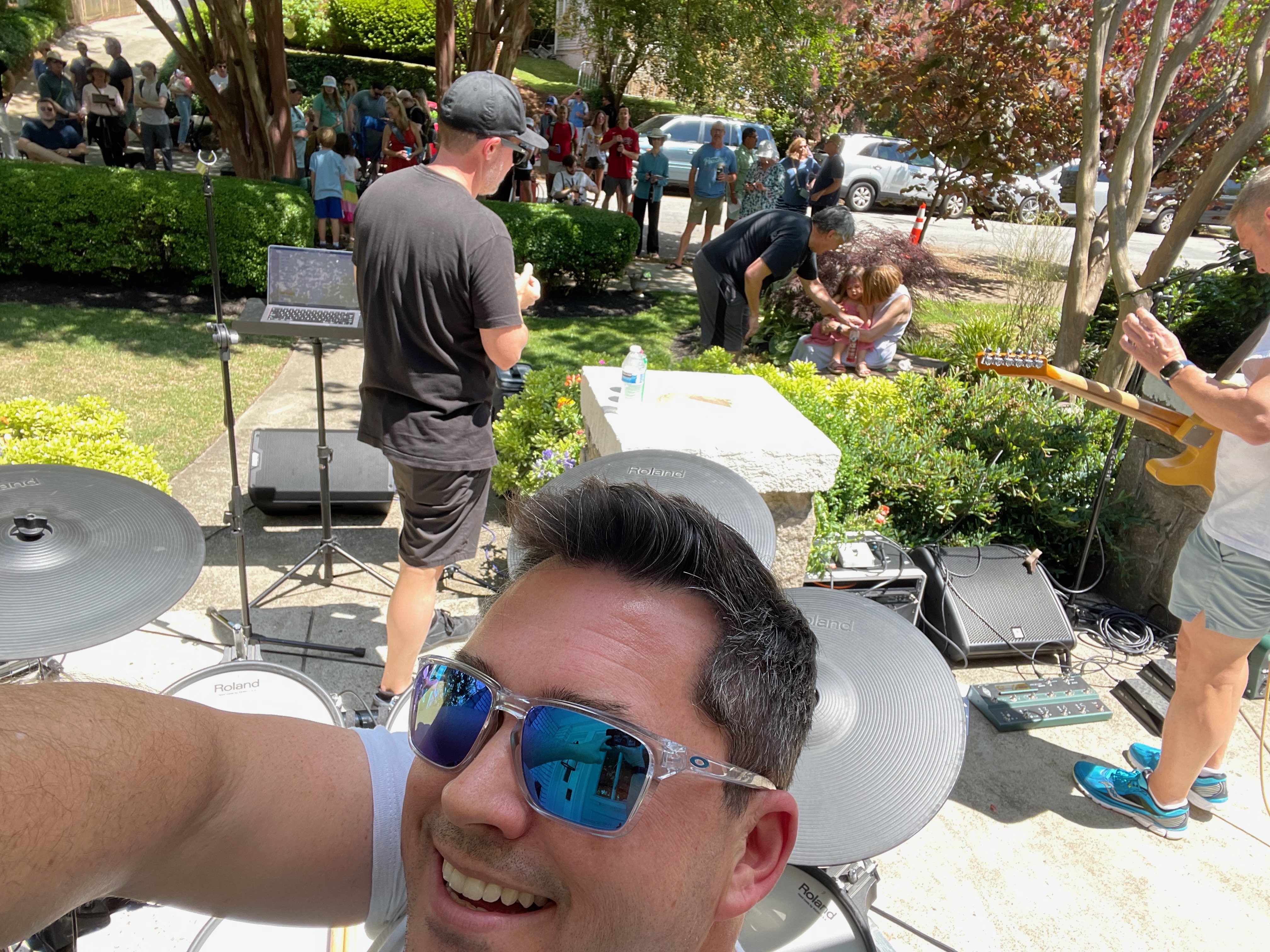 Full band performing at community festival